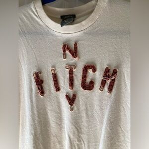 Men’s medium Abercrombie and Fitch short sleeve white T-shirt with letters
